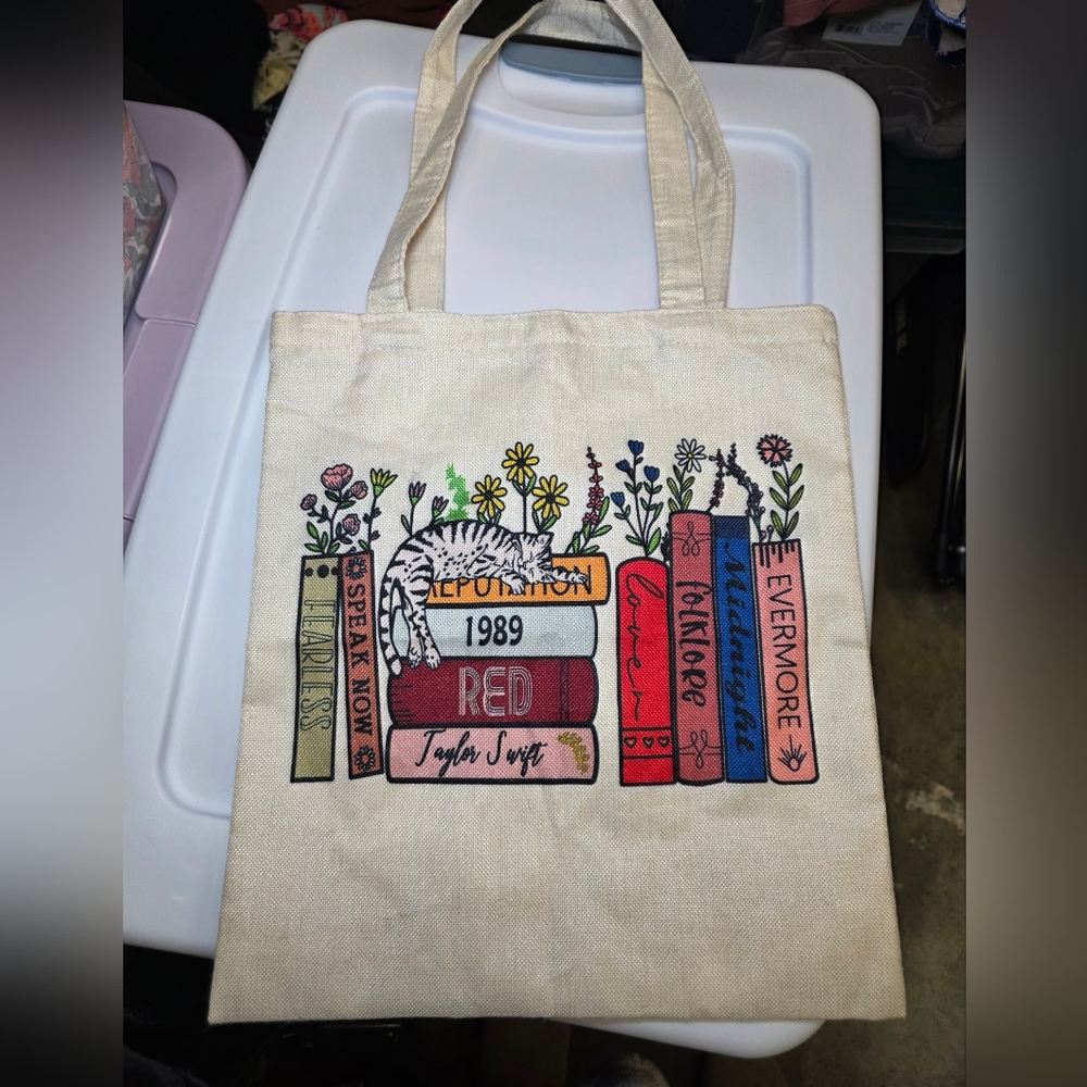 Taylor Swift Cream Tote Bag with Multicolor Book Spine Design
